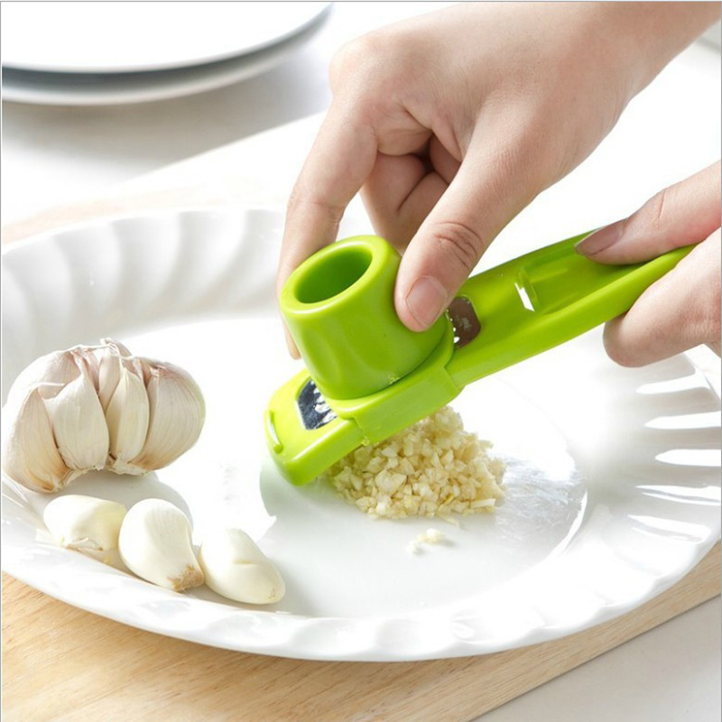 Kitchen Gadgets Green - Mini molinillo de ajo creativo, prensa